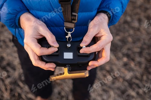Preview: Person holding remote controller
