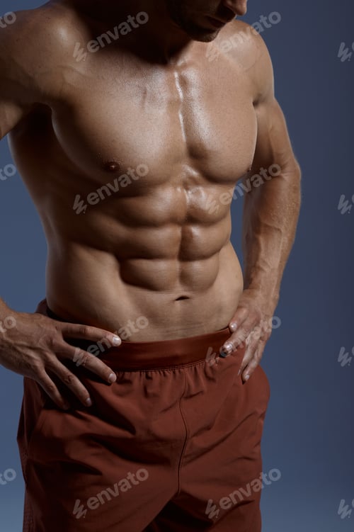 Preview: Muscular male athlete, photo shoot in studio