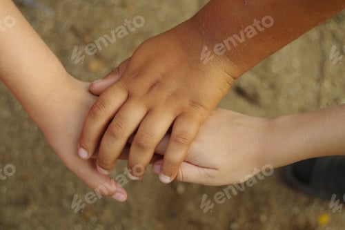 Preview: children of different nationalities holding hands, a symbol of friendship and peace