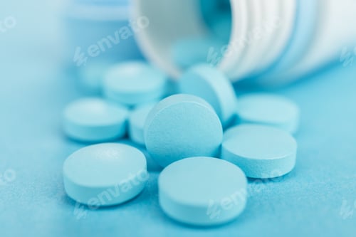 Preview: Overturned Plastic Jar With Blue Pills