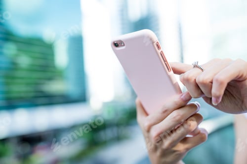 Preview: Woman use of mobile phone