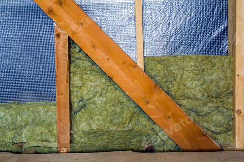 Preview: Thermal insulation mineral rock wool installation at the new building attic wall