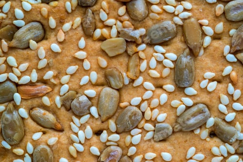 Preview: Abstract Natural Texture Of Cookies With Grains And With Seeds Closeup For A Background A Full Shot