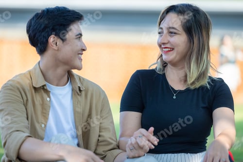 Preview: LGBT couple sharing romantic love and care in public, celebrating joyful union as life partners.