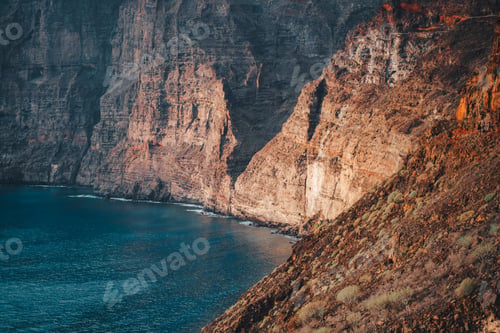 Preview: Los Gigantes cliffs, mountain ranges and deep ocean view at sunset. Tenerife. Santiago del Teide