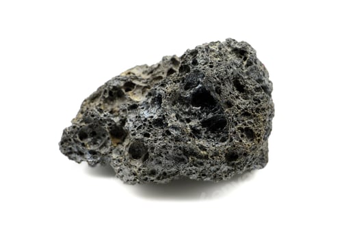 Preview: black pumice stone from teide volcano at Tenerife on white isolated background.