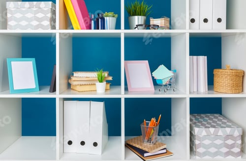 Preview: Stacks of supplies and paperwork in the office and bookshelves