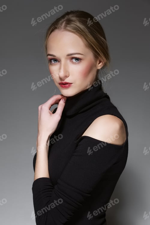 Preview: charming young lady touching her chin