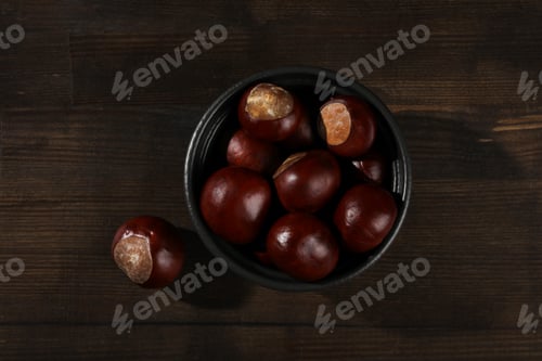 Preview: Fresh and ripe chestnuts, top view, Autumn chestnuts