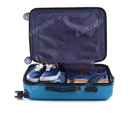 Preview: Open suitcase packed for travelling on white background
