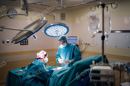 Preview: Surgeons and nurse during a foot surgery