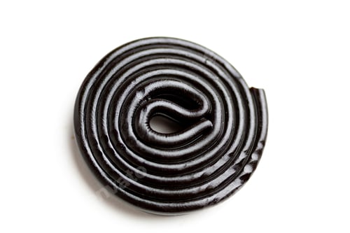 Preview: Closeup shot of black licorice isolated on a white background