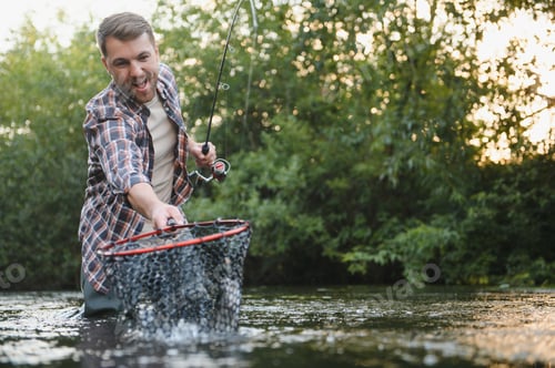 Preview: Fisherman hunting trouts in mountain river. Fishing net detail.