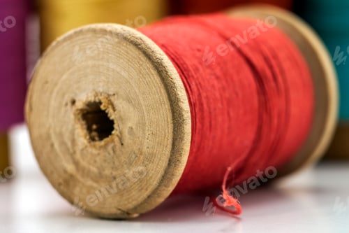 Preview: Reels or spools of multicolored sewing threads. Threads of all colors.