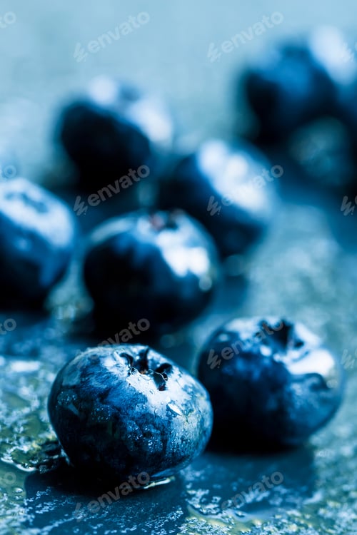 Preview: Fresh ripe blueberries on a dark background, selective focus