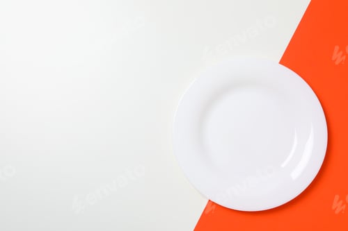 Preview: Empty plate on two tone background, space for text