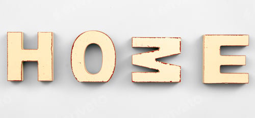 Preview: The word Home from wooden letters on a white background.
