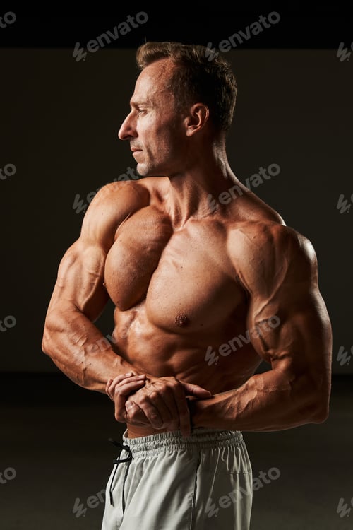 Preview: His muscles, a canvas for adrenaline, sculpted with intensity, embodying the artistry of strength in