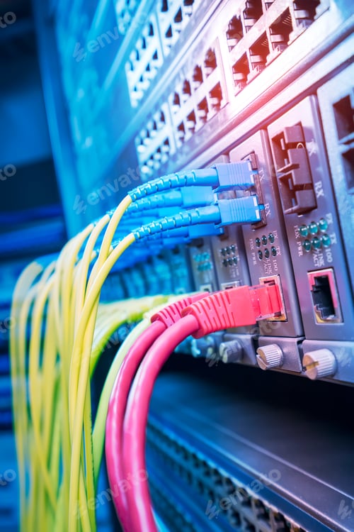 Preview: Fiber Optic Cables Connected To An Optic Ports And Utp Network Cables Connected To An Fast/Giga