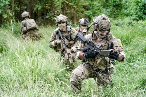 Preview: Soldier in full US MARSOC armed with assault rifle run through the abandoned building. Military