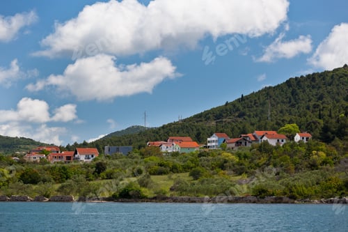 Preview: Croatian coastline with a village view from the sea