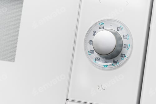 Preview: New modern microwave oven in a shop, close up