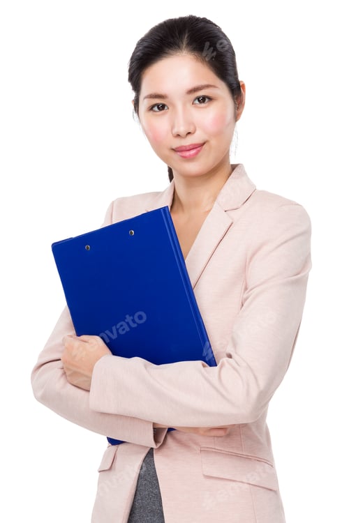 Preview: Asian businesswoman hold with clipboard