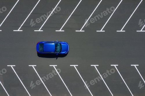 Preview: Transportation. View on the car from the air. Car in an empty parking lot.