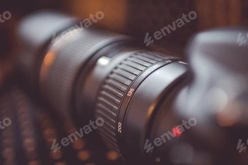 Preview: Closeup of a black camera zoom lens