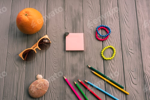 Preview: artist pencils for inscription. accessories sunscreen spf care. sunglasses orange fruit pebbles.