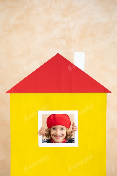 Preview: Artist child holding hiding in paper house