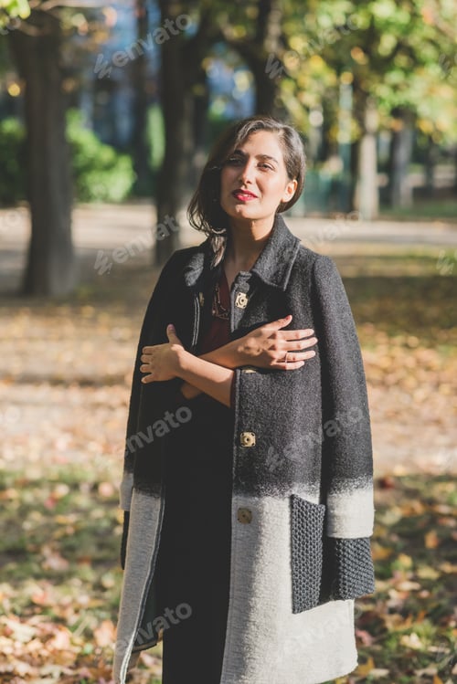Preview: Young woman outdoor autumn leaves