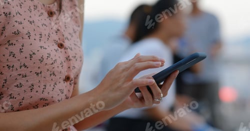 Preview: Woman use of smart phone at outdoor