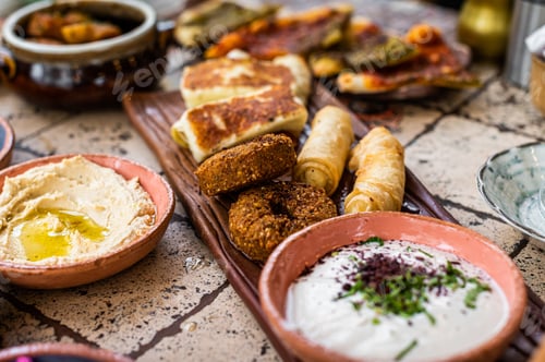 Preview: Fried cheese and falafel with sause in Turkish Village Breakfast. Top view