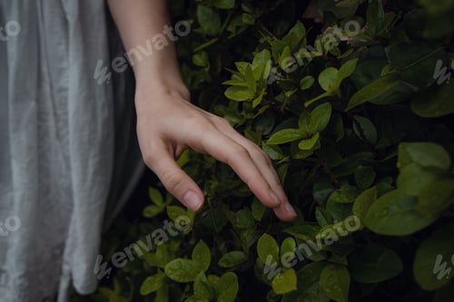 Preview: Attractive young woman enjoying her time outside in park