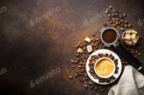Preview: Cup of coffee, roasted coffee beans and filter holder at dark table.