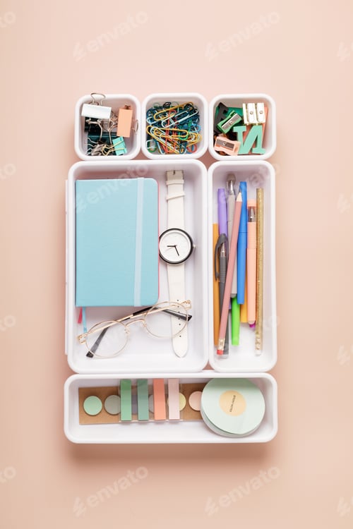 Preview: Desktop organization. Cleaning up messy stationary in plastic organizers