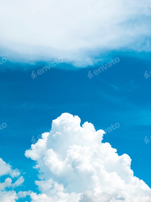 Preview: White puffy clouds and blue sky