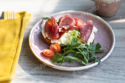 Preview: Toast with Egg, Prosciutto, Tomatoes and Greens