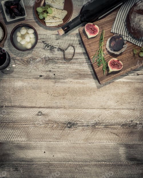 Preview: cheeses and brown bread on wooden table