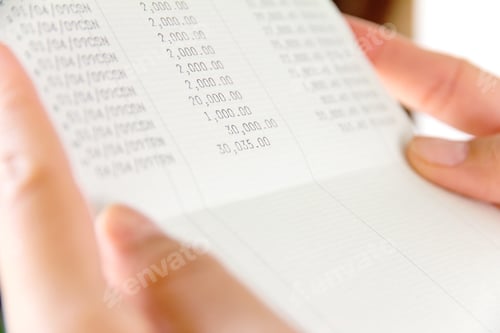 Preview: Hand holding bank account book,financial concept