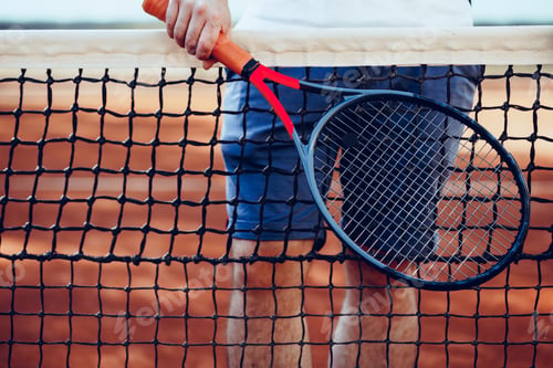 Preview: Tennis racket and tennis net on tennis court