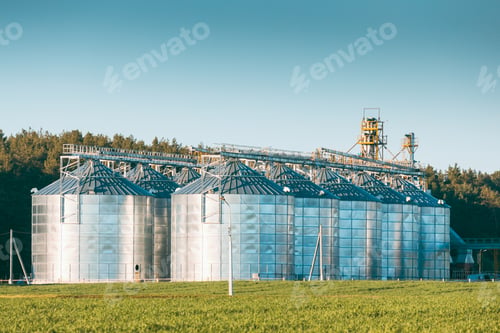 Preview: View Modern Granary, Grain-drying Complex, Commercial Grain Or Seed Silos In Sunny Spring Rural