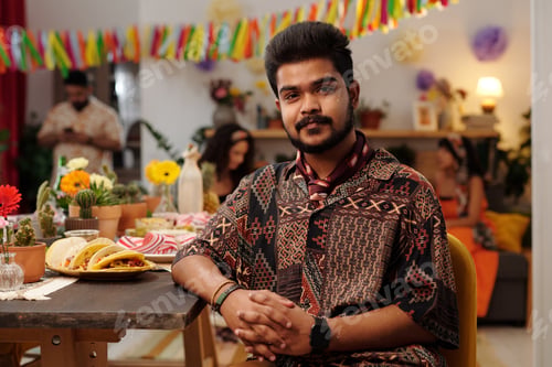 Preview: Young Latino man in ethnic apparel