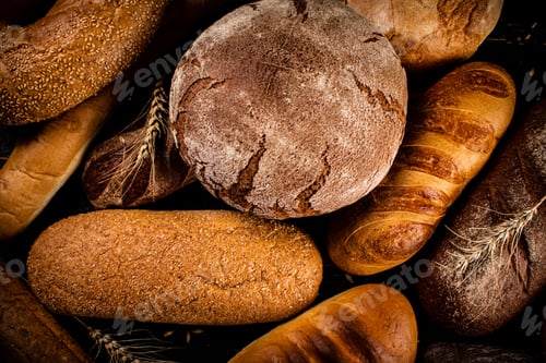 Preview: Different types of bread. Macro background.
