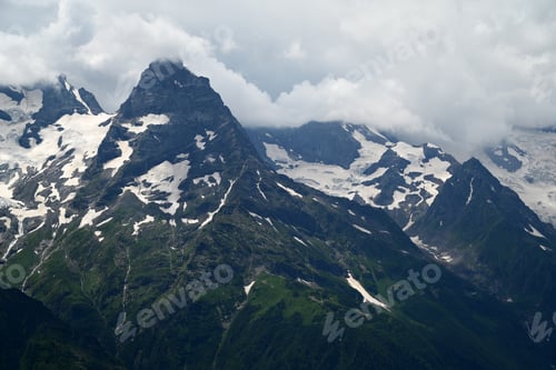 Preview: Mountain range with dramatic clouds