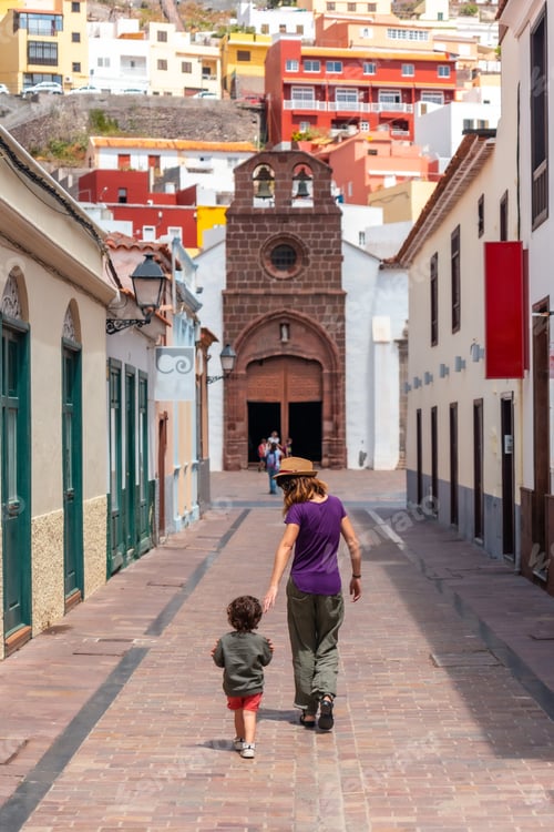 Preview: Vacation concept, mother with her son in the city of San Sebastian de la Gomera