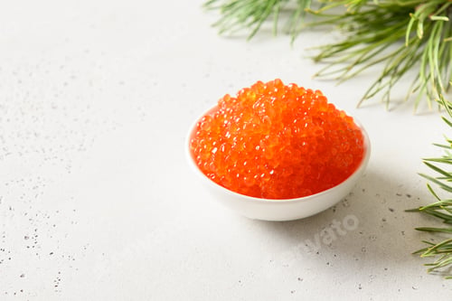 Preview: Red caviar in bowl for New Year or Christmas party.