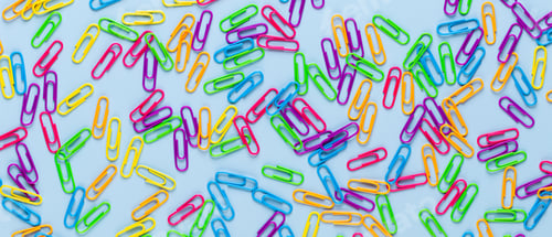 Preview: Paper color clip notebook on blue background. Flat lay.