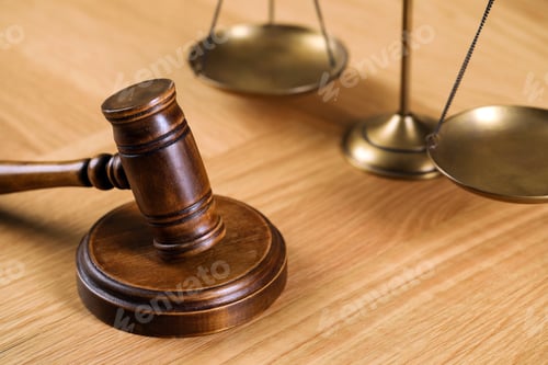 Preview: Wooden gavel and scales of justice on table. Space for text